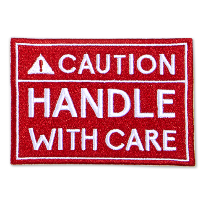 Oliver Thomas Badge - Caution