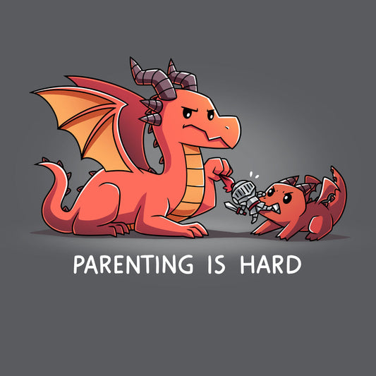 Premium Cotton T-shirt_TeeTurtle charcoal gray Parenting is Hard apparel featuring a parent dragon holding onto a toy knight while its baby dragon grabs it with its mouth.