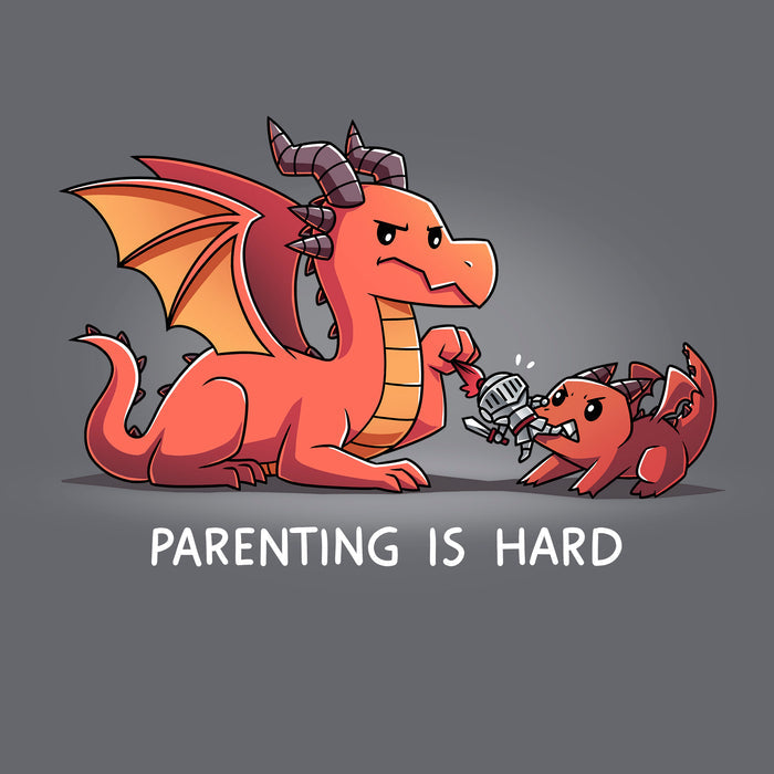 Classic Cotton T-shirt_TeeTurtle charcoal gray Parenting is Hard apparel featuring a parent dragon holding onto a toy knight while its baby dragon grabs it with its mouth.