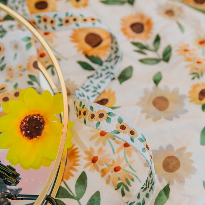 A soft, cozy Pet Blanket - Sunflower Dreams by Sassy Woof features cheerful yellow sunflowers.