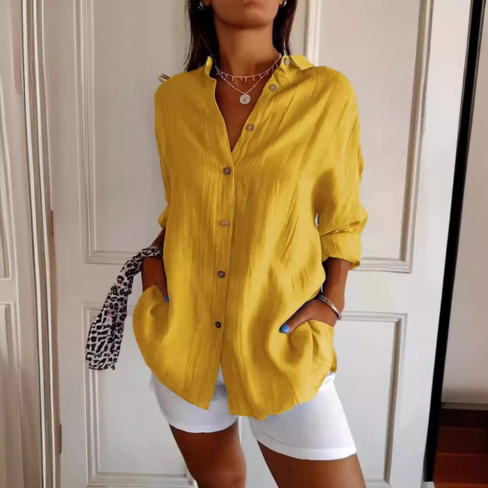pleated long sleeve shirt back view showing smooth drape and long sleeves on loose fit solid color shirt blouse