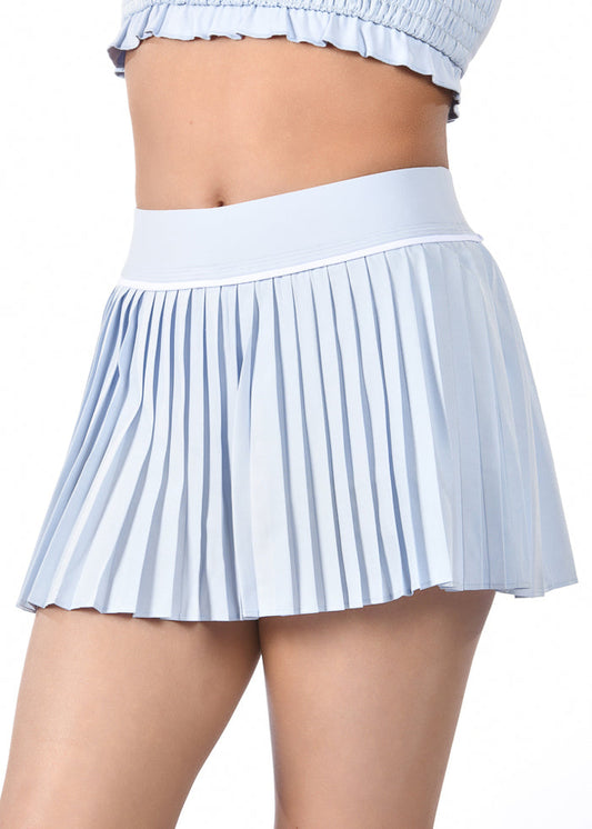 Light blue pleated skirt worn by a person on a white background