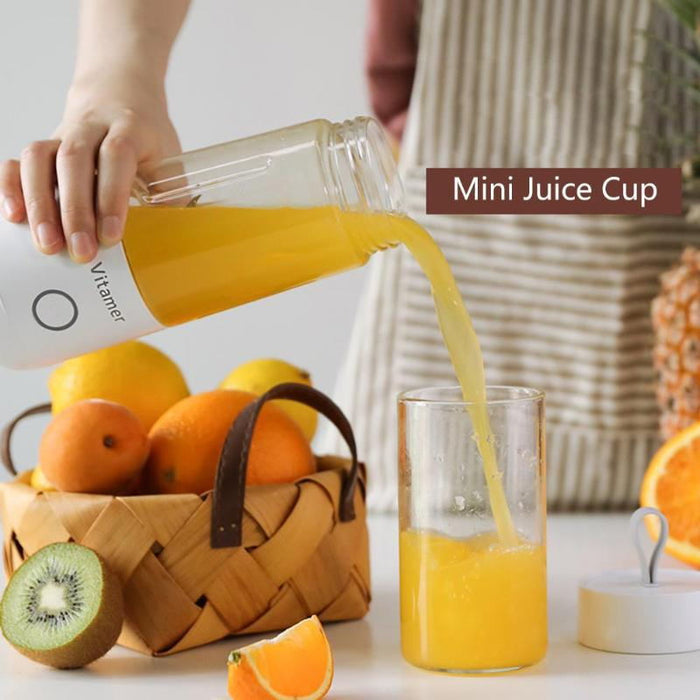 "travel portable blender 350ml in backpack side pocket next to reusable water bottle ready for airport journey smoothies"