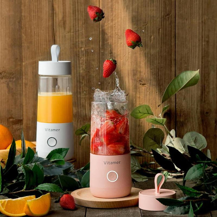 "usb rechargeable blender compact 350ml smoothie cup charging from power bank on café table during remote work session"