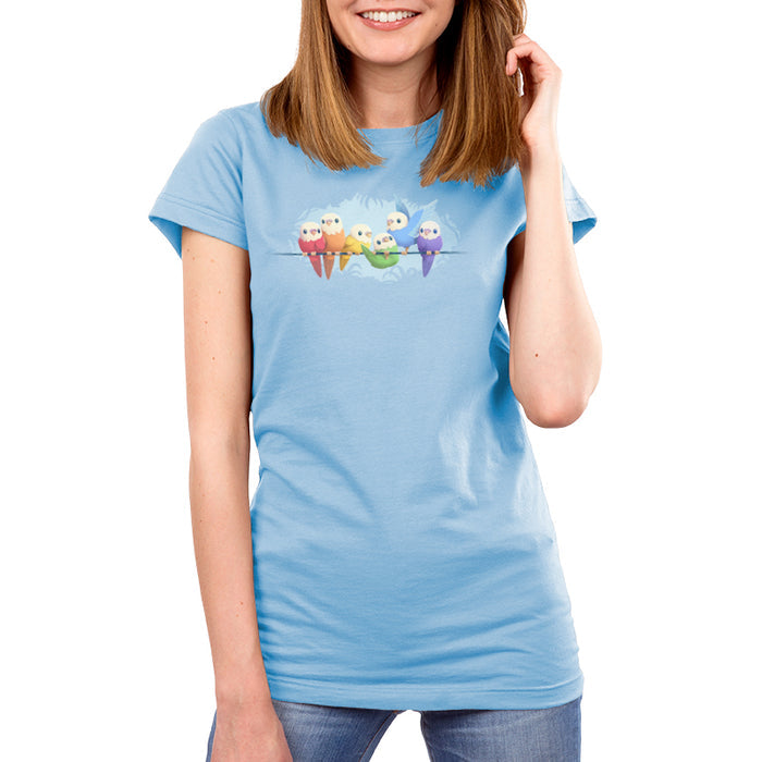Premium Cotton T-shirt_TeeTurtle light blue Rainbow Parakeets apparel featuring a flock of parakeets on a brand in different colors of the rainbow.