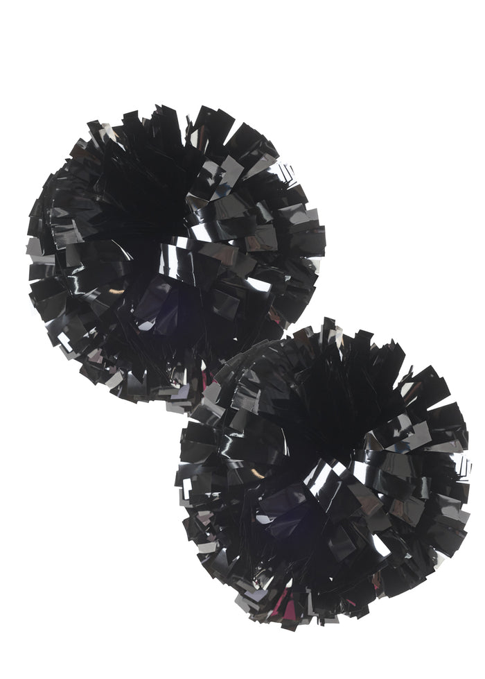 Black and silver pom-poms on a white background