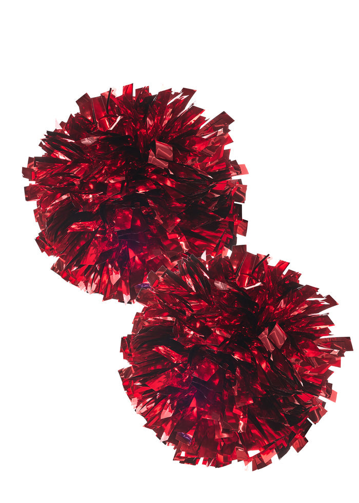 Two red metallic pom-poms on a white background