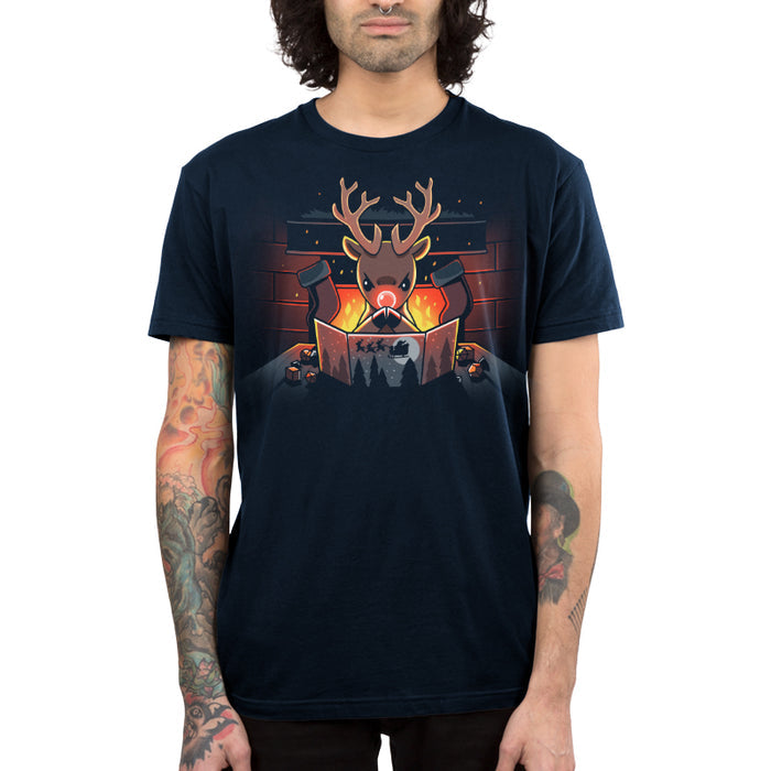 Premium Cotton T-shirt_TeeTurtle navy blue Reindeer Game Master featuring a reindeer in a tabletop game christmas scene. The reindeer glowing red nose debating their next game move with dice around the table, in front of a bright fire and stockings hung on the chimney.