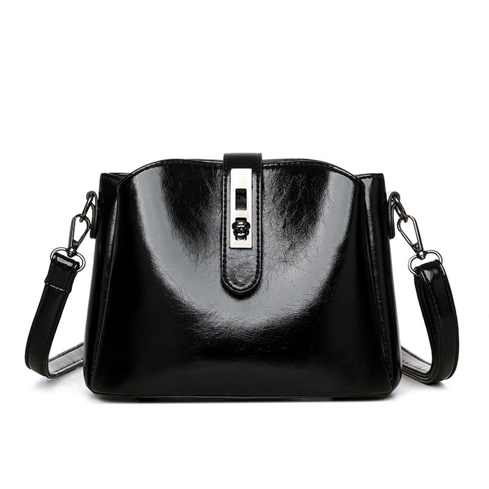women retro shoulder bag styled with neutral outfit highlighting refined silhouette and finish
