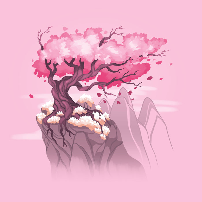 Premium Cotton T-shirt_TeeTurtle Sakura Tree light pink t-shirt featuring an illustration of a pink cherry blossom tree on a rocky cliff with mountains in the background. Blossoms and petals are being blown in the wind.