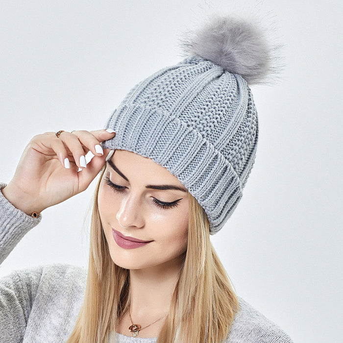 Wine red satin lined beanie with soft knit and paisley inner, chic winter pom pom hat for effortless quiet luxury looks