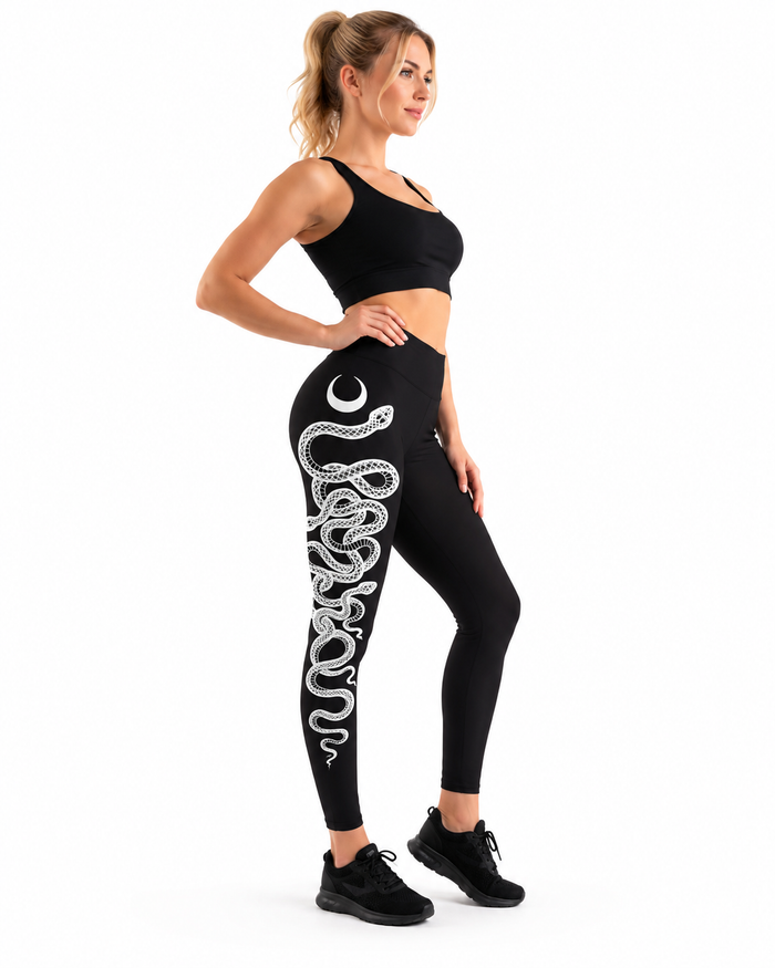 Polyester snake print leggings in black with white lunar serpent art for yoga, Pilates, strength training and casual outfits.