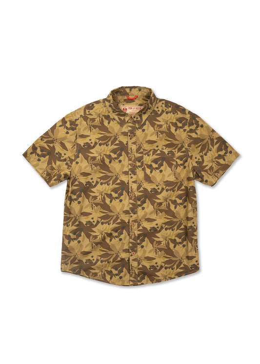 Short-sleeve shirt with a brown and tan leaf pattern, buttoned front, and a collar, displayed against a white background.