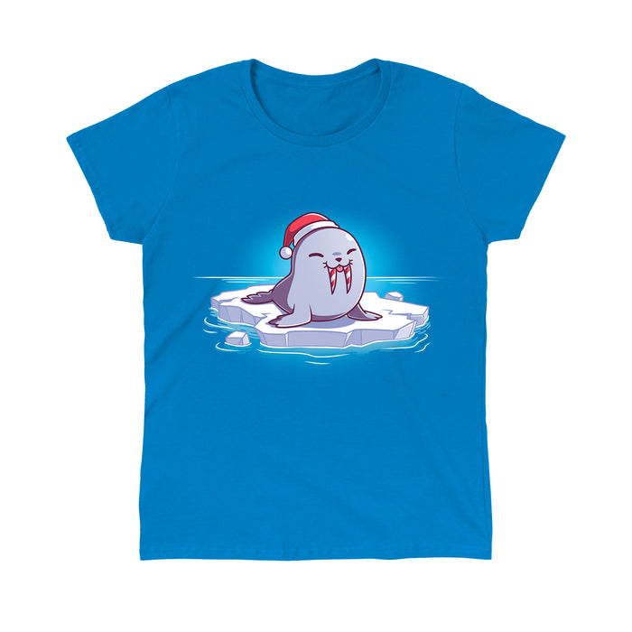 Classic Cotton T-shirt_TeeTurtle sapphire blue Sweet Tooth apparel featuring an illustration of a happy walrus sticking out it's tongue, wearing a Santa hat, and sitting on a floating ice. It's tusks are striped with red and white like candy canes.