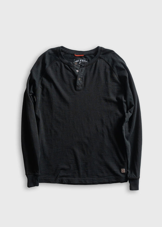 Black long-sleeve henley shirt with buttoned placket, displayed on a gray background. Simple, casual design for everyday wear.