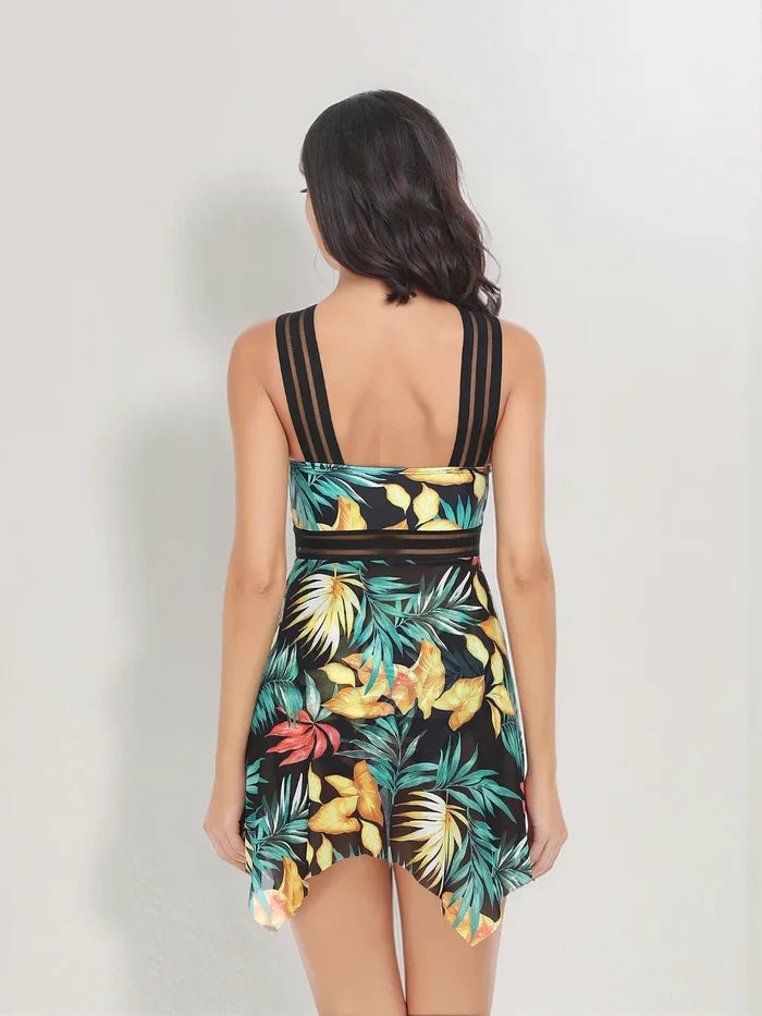 Printed women's swim set with a crisscross top and matching bottoms, displayed online for size and style review at PrintOne1.