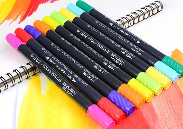 Watercolor-style brush pens arranged by color for creative drawing, lettering, concept sketches and controlled fine line work