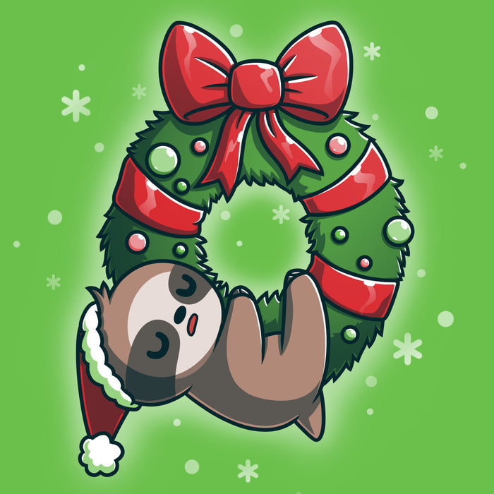Premium Cotton T-shirt_TeeTurtle We Wish You a Lazy Christmas apple t-shirt featuring a cartoon sloth in a Santa hat, snoozing while hanging from a festive wreath adorned with red ribbons and ornaments.