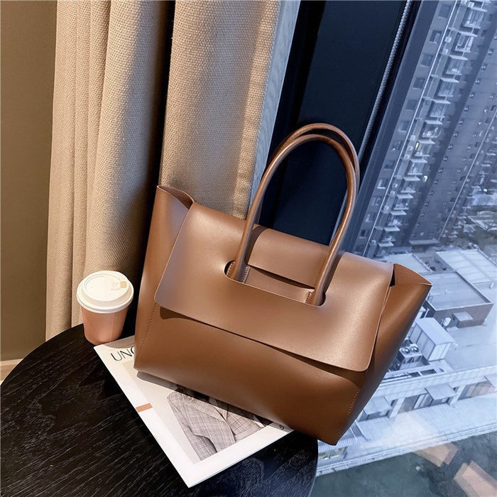 women shoulder bag top view showing spacious opening and structured form