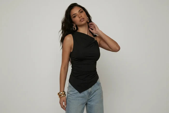 women’s asymmetrical pleated tank top fabric texture and drape detail