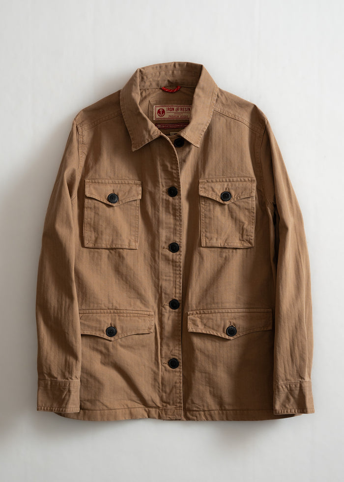 Brown button-up jacket with four pockets, black buttons, and a collar, displayed on a white background.