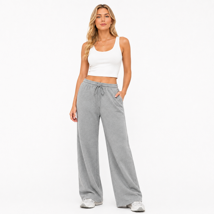 Casual elastic waist pants with drawstring detail, loose silhouette and versatile black gray or apricot colour choices daily.