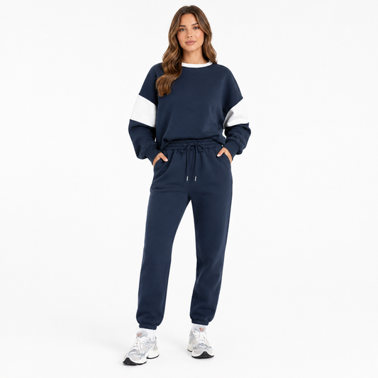 Women's navy drop shoulder sweatshirt set front view on model against a clean white studio background