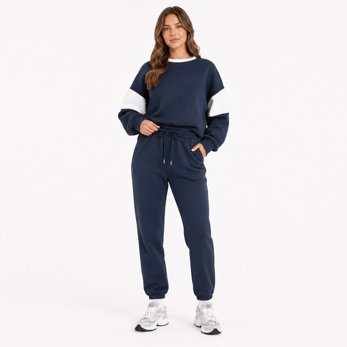 Women's navy drop shoulder sweatshirt set model view highlighting drawstring waist and relaxed fit