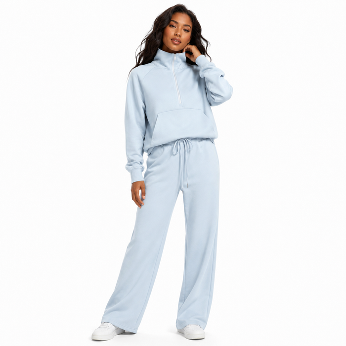 Clean women's tracksuit set with a half zip top, elastic waist and wide leg trousers for relaxed, polished styling every day.