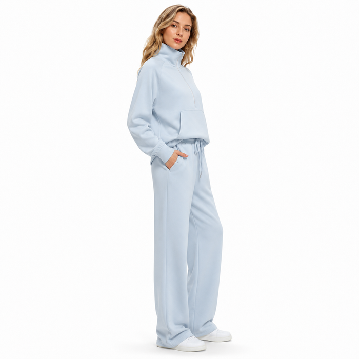 Women's half zip tracksuit set designed for travel, errands and home wear with a relaxed fit and polished appearance all day.