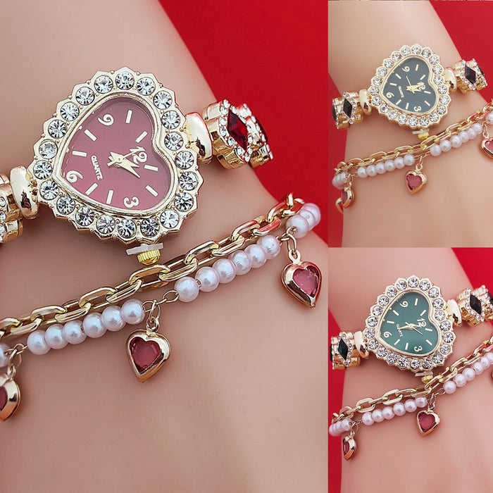 Close up of gold women’s heart shaped bracelet watch with black dial, crystal halo and matching heart charm bracelet
