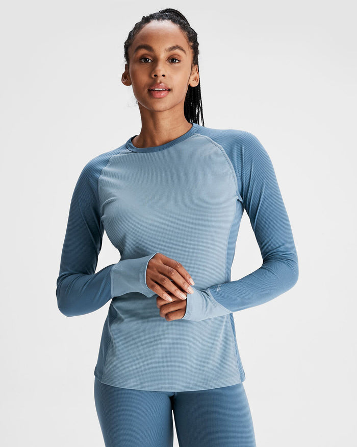 b1176_nwy_kmdaction_womens_long_sleeve_top_v2_blue_a_1743632097000