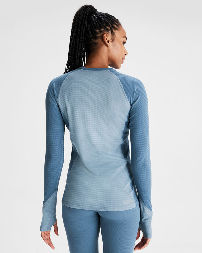 b1176_nwy_kmdaction_womens_long_sleeve_top_v2_blue_c_1743632098000