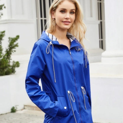 lightweight waterproof windbreaker pink on female model hiking