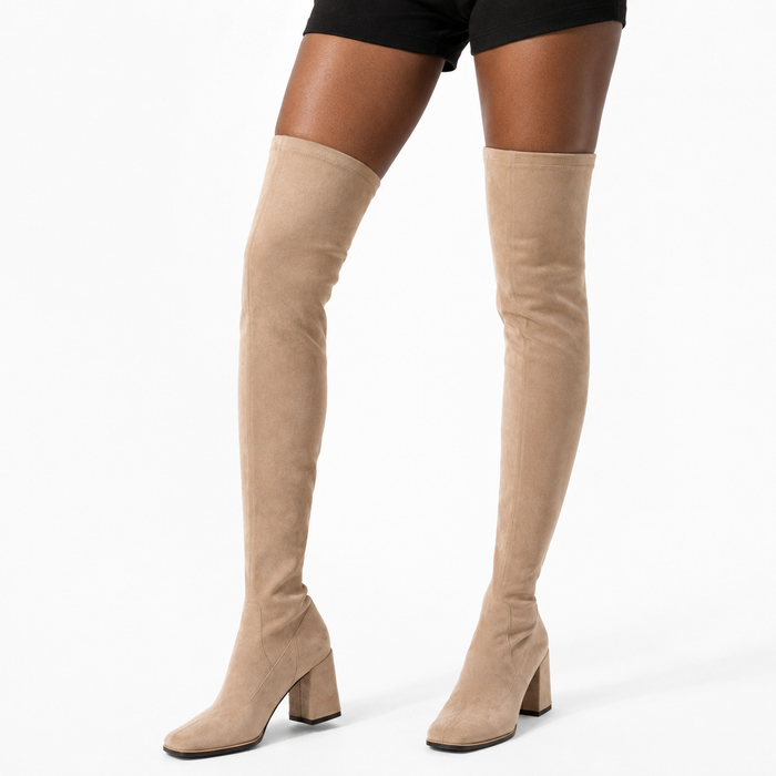 Women over the knee boots with stretch PU upper, square toe, side zipper and stable chunky mid heel for fall and winter wear.