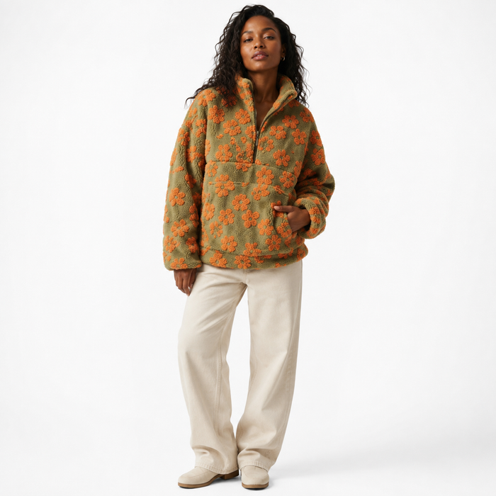 Women's floral fleece top with plush polyester sherpa texture, loose fit, half-zip front and large pocket for daily layering.