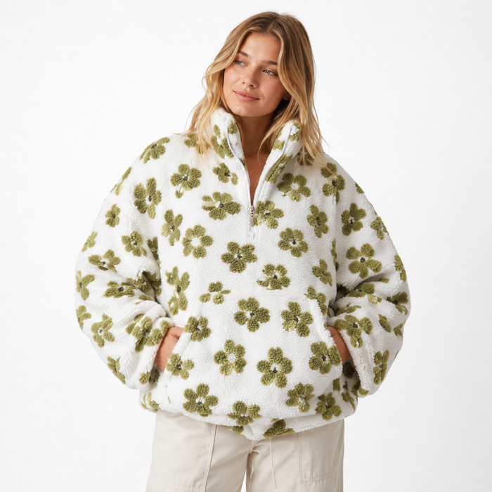 Floral half-zip sherpa sweatshirt with loose sleeves, soft polyester fleece and a large pocket for hands, phone and keys too.