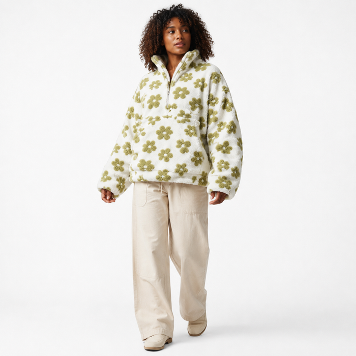 Women's teddy fleece pullover with flower print, half-zip neckline, comfortable loose fit and a practical large front pocket.