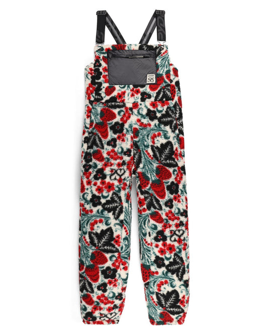 Floral patterned overalls with black straps on a white background
