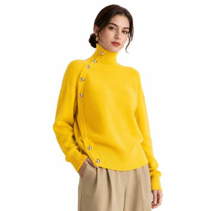 Women's yellow turtleneck sweater with gold button details on model against clean white studio background