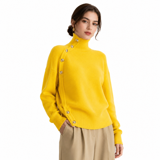 Women's yellow turtleneck sweater with gold button details on model against clean white studio background