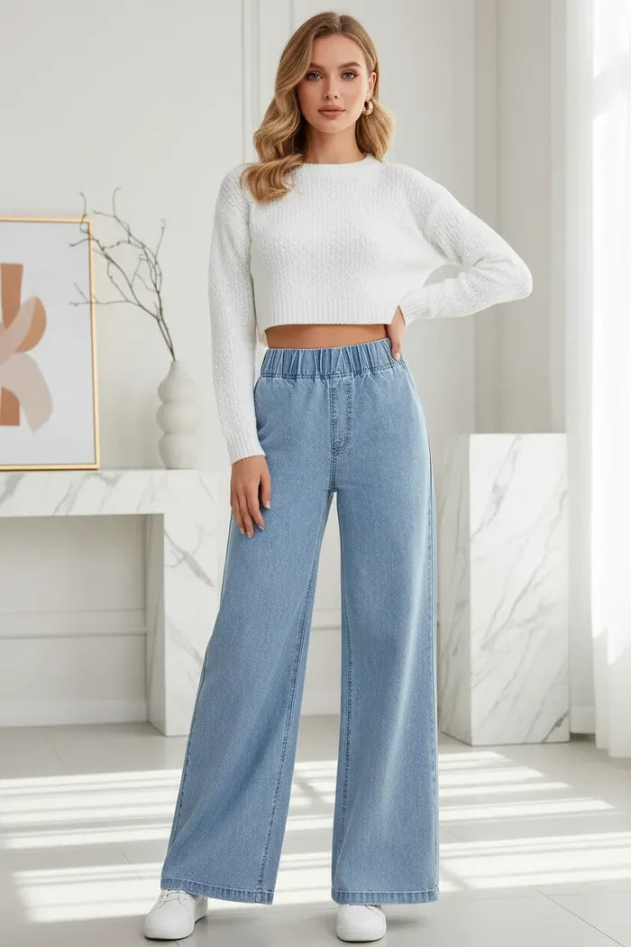 wide leg plus size jeans black mid waist fit styled with minimal top indoor setting
