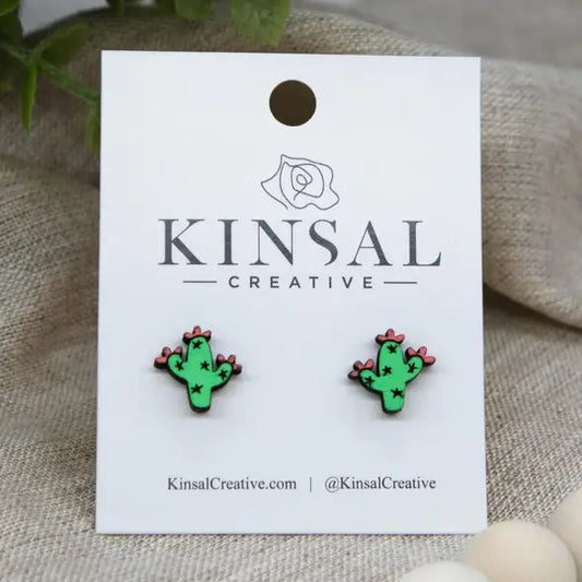 Wooden blooming saguaro cactus stud earrings on a white Kinsal Creative display card