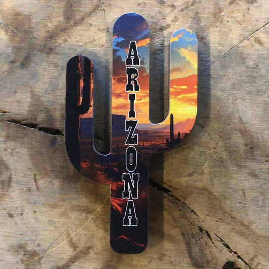 Wooden cactus magnet showing a desert sunset in Arizona with silhouettes and sky.