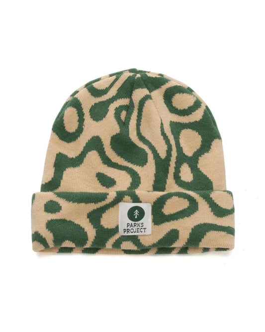 Yellowstone Geysers Beanie in beige and green abstract pattern with a Parks Project label